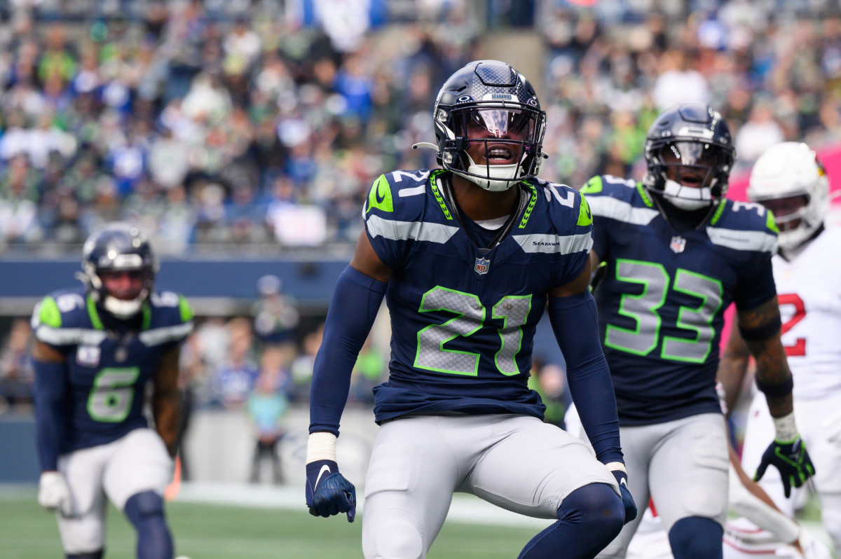 Seattle Seahawks cornerback Devon Witherspoon (21) celebrates after the defense made a play against the Arizona Cardinals during the second half at Lumen Field. 
